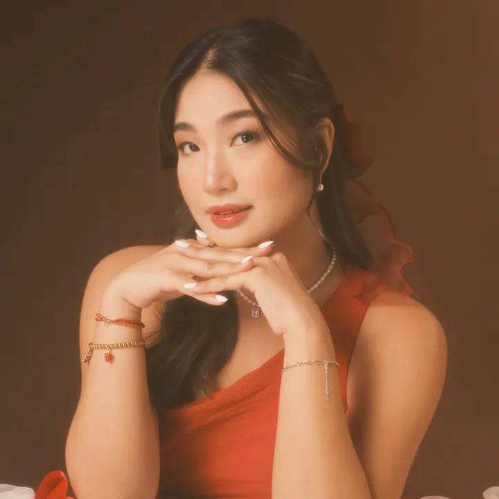 Kat De Guzman