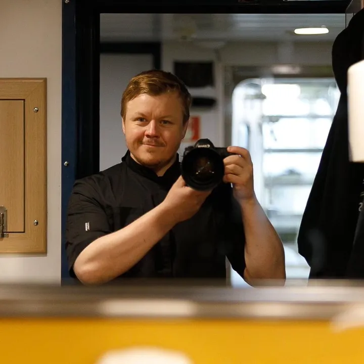 The Photographing Fisherman