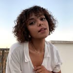inès, the one with curly hair