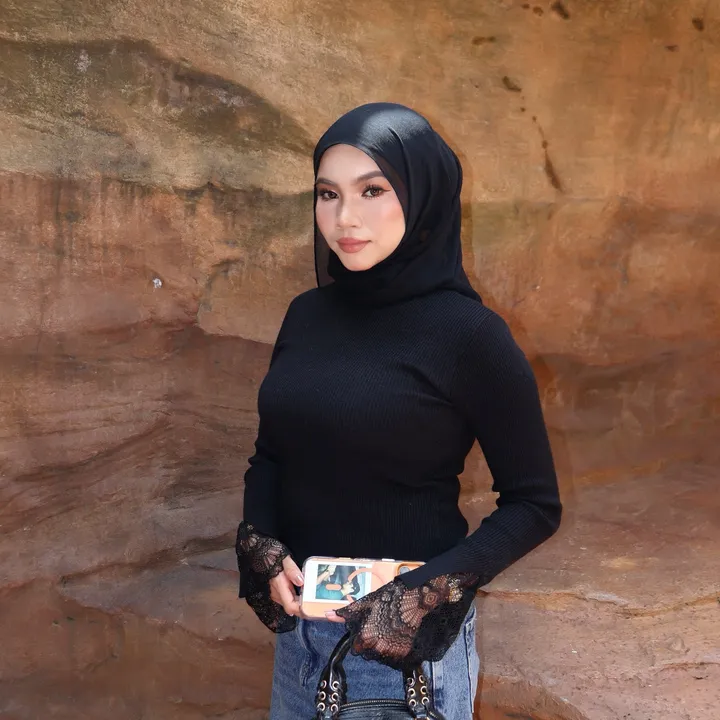 M.