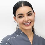Dr. MARIA ENEZARI
