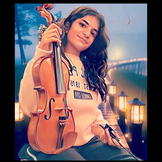 عازفة الكمان 🎻